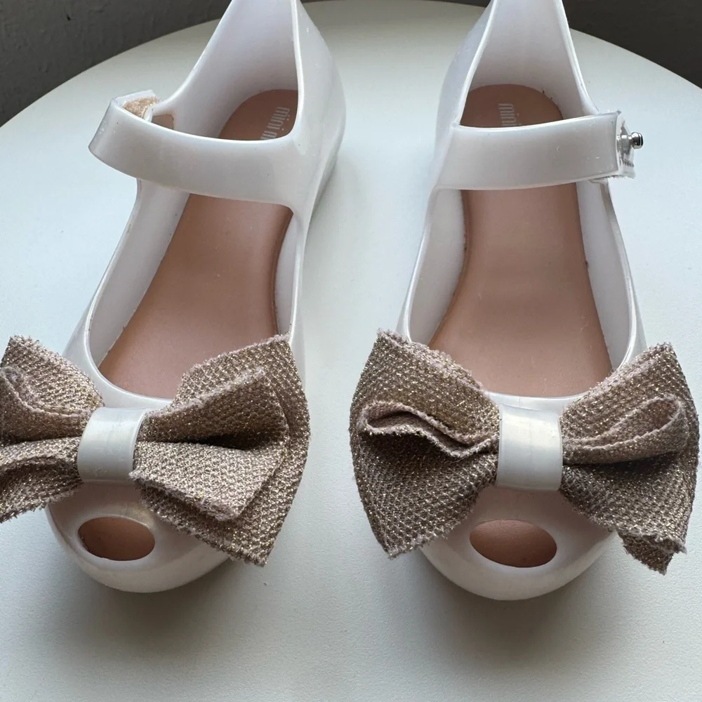 Mini Melissa White Mary Jane Jelly Shoes with Gold Bow Accent